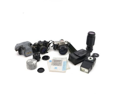 Two Minolta SLR cameras and accessories, comprising X700 camera body serial no. 1349766 with a Minolta MD 50mm 1:1.7 lens ser
