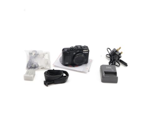 Canon PowerShot G12 digital camera serial no. 293053002775, boxed with charger, software and instructions