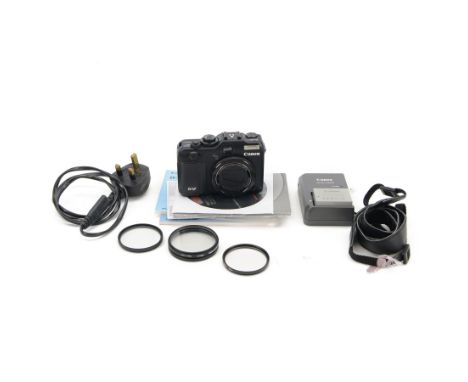Canon Powershot G12 digital camera serial no. 28305301889,  with software, chargers and accessories, boxed