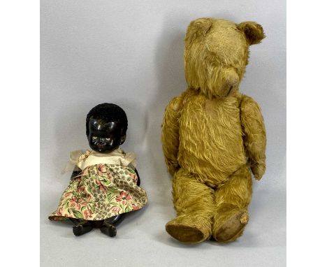 VINTAGE STRAW FILLED MOHAIR TEDDY BEAR with growler, 54cms (l) and a vintage baby doll with composite head and body, 33cms (l