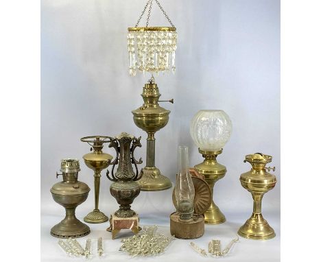 GROUP OF BRASS OIL LAMPS and a pendant ceiling light fitting with cut glass dropsProvenance: private collection Conwy