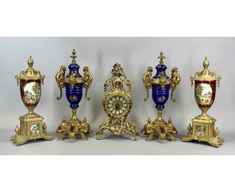 ROCOCO FORM GILDED BRASS CASED MANTEL CLOCK, 31cms (h) with gilt metal and porcelain garnitures, two pairs, 37cms (h) the tal