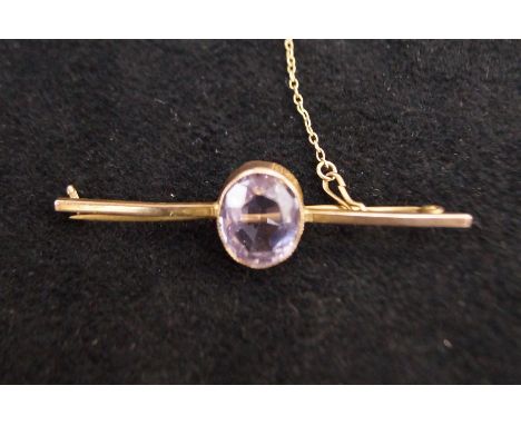 9ct Gold pin brooch set with large amethyst? with safety chain  