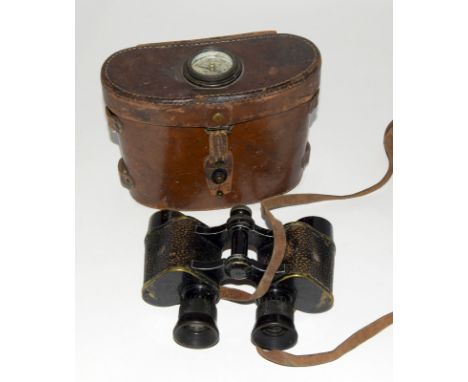 A pair of WW1 U.S. Army Signal Corps binoculars by Bausch & Lomb Optical. Serial No. EE 91300. In their original brown leathe