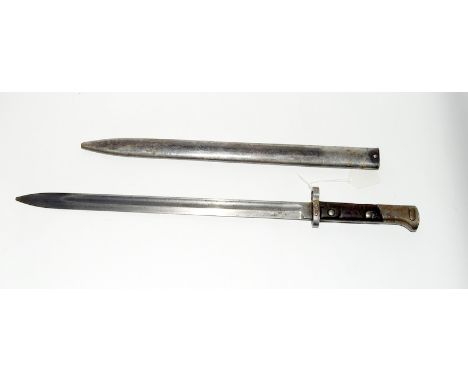 A Belgian model 1924 bayonet in its steel scabbard. This bayonet was made for the Greek Army. Blade length 39.5cms