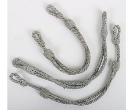 WW2 German Officers Hat Cords: Period silver wire hat  officers cords in good condition. 3 items Estimate 