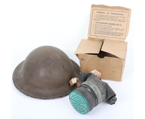 WW2 British Steel Helmet: Clean army helmet complete with liner and chin strap, missing top pad and civil gas mask in box. 2 