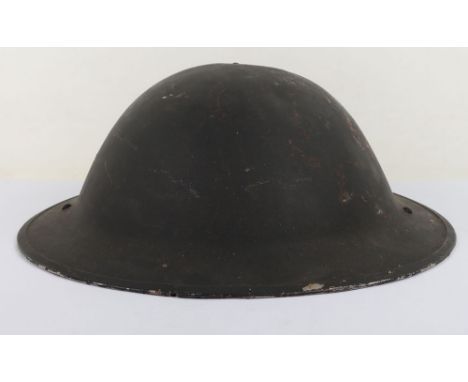 WW2 Civil Defence Helmet: Home front helmet made from WW1 Brodie helmet relined and painted black for use in WW2. 