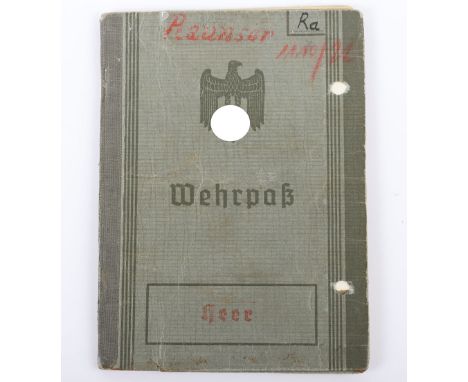 WW2 German Army Wehrpass Issued to a Medic in Mountain Troop Regiment Serving in North Finland, interesting and well filled o