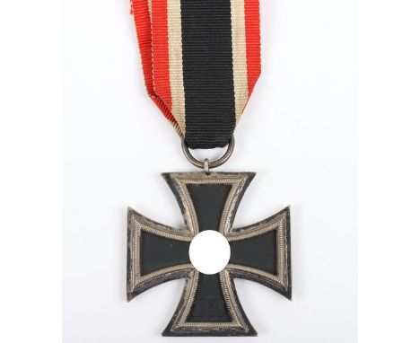 WW2 German 1939 Iron Cross 2nd Class by Klien & Quenzer (65), fine example with dark patina to the frame. Mounted with a ribb