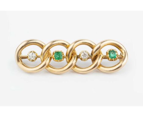 A late 19th/early 20th century emerald and diamond set bar brooch, designed as an openwork curb-link panel, spaced by alterna