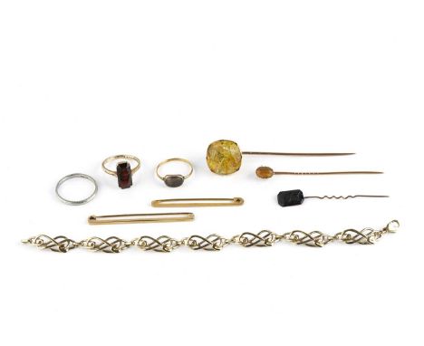 A collection of jewellery, comprising a 9ct gold fancy-link bracelet, two single stone stick pins, a cameo stick pin, two bar