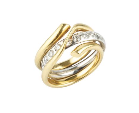 A diamond set 'Magic' combination ring by Georg Jensen, comprising an 18ct yellow gold double row openwork band of crossover 