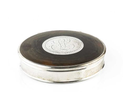 A 19th century silver and tortoiseshell snuff box, of plain oval design, the hinged lid with inset oval bright-cut plaque, wi