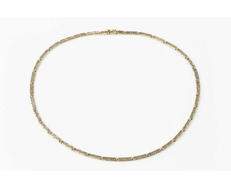 A yellow precious metal fancy-link necklace, designed as a series of openwork Greek key panels, stamped '585', length 44cmCon