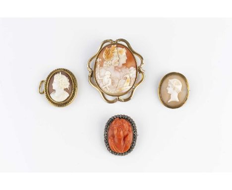 A collection of antique cameos, comprising a coral corallium rubrum cameo brooch, carved to depict Dionysus, the Greek god of