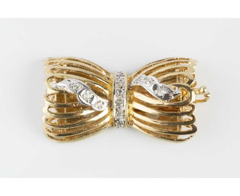 A diamond set clasp, modelled as a fluted openwork ribbon bow, with single-cut diamond accents, 14ct gold mounted, with Londo