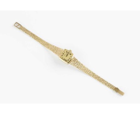 A lady's 9ct gold bracelet watch by Roamer, the cushion-shaped gilt dial with black Roman numerals, to a jewelled manual wind