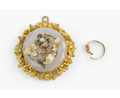 A 19th century pendant/brooch, centred with a circular chalcedony panel with faceted border, applied with a turquoise set flo