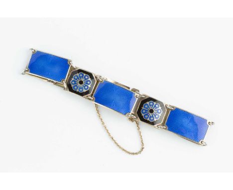 A Norwegian enamel panel bracelet by David Andersen, designed as a series of blue and black enamel panels with repeating flow