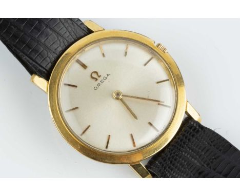 A gentleman's gilt metal wristwatch by Omega, the circular silvered dial with gilt baton markers, to a calibre 620 jewelled m