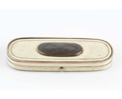 A Georgian ivory patch box, of elongated oval form, having glazed hairwork panel to the cover, 9cm long.