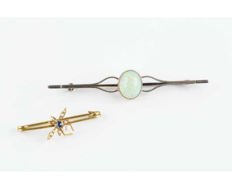 An opal single stone bar brooch, the oval cabochon opal in collet setting, to a bi-colour mount with openwork shoulders, stam