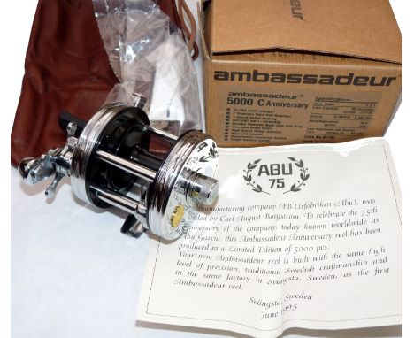 REEL: Abu Ambassadeur 5000C Anniversary reel in chrome finish, foot stamp 050005, 3 screw end plate, level wind, c/w COA, lea