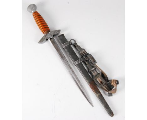 A German Third Reich Luftwaffe 2nd pattern Officer's dagger, having an unmarked 25.5cm double edged blade with aluminium eagl