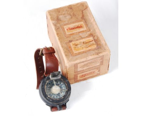 An Air Ministry F3A/261 Compass Wrist Type serial No. 879B / 55, Patt No. 261, in original card box with matching numbers. Ov