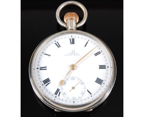 An Omega military issue nickel cased open face pocket watch, having an enamel dial with Roman numerals and subsidiary seconds