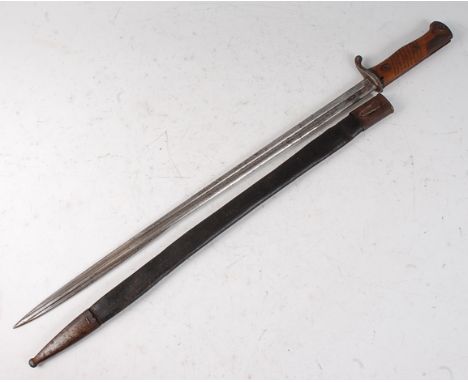 A German 1898 pattern Mauser bayonet, the 52cm pipe-back fullered blade stamped to the ricasso V.C. Shilling Suhl and further