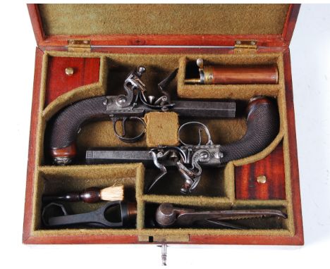 A cased pair of 19th century travelling pistols, each having 6.5cm octagonal turn-off steel barrels engraved at the muzzle an