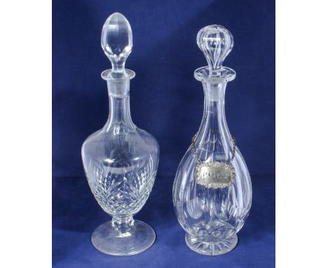 A sherry decanter together with a port decanter and silver port label