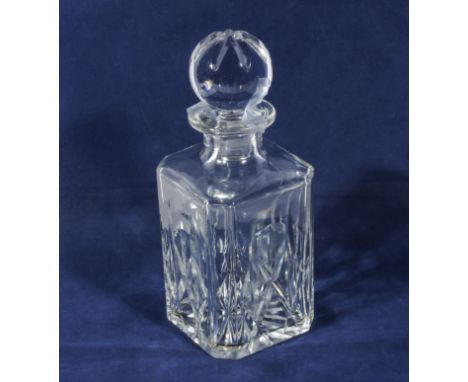 A crystal glass decanter