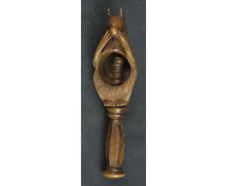 CARVED AND TURNED TREEN WOODEN NUT CRACKER in the form of a squirrel.  18cm long approx. CONDITION REPORT: Minor chips to ear