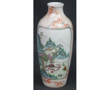 CHINESE PORCELAIN OVOID SHAPED VASE painted in enamels with a reserved mountain village scene and having character mark panel