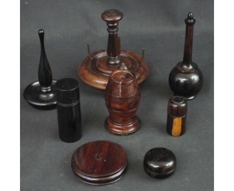 GROUP OF EBONY ROSEWOOD AND OTHER TURNED TREEN ITEMS to include ring stands, boxes and jar covers, bobbin stand etc.  (8)