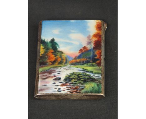 SILVER AND ENAMEL ENGINE TURNED CIGARETTE CASE, the enamel front depicting river landscape, Stamped: 925 and initialled: A.J.