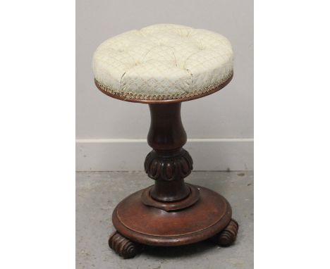 VICTORIAN MAHOGANY ADJUSTABLE PIANO STOOL with circular button upholstered top on baluster turned and moulded column with cir