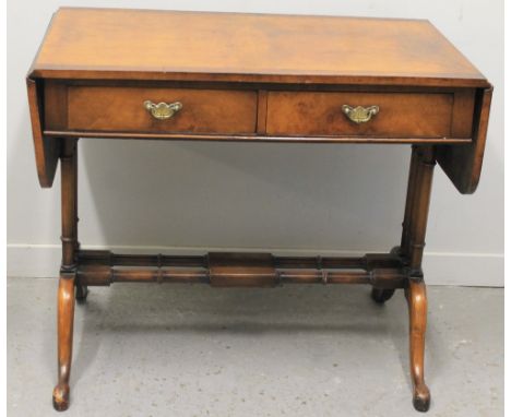 GEORGIAN STYLE MAHOGANY CROSS BANDED SOFA TABLE having two frieze drawers on triple turned end supports with double stretcher