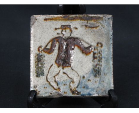 BERNARD LEACH POTTERY TILE depicting onion man seller circa 1943, impressed marks to reverse. 
Provenance: vendor's father re