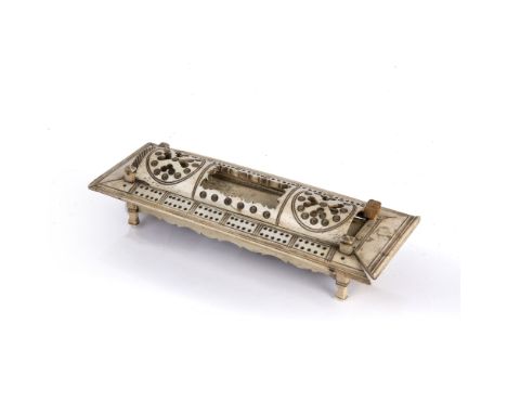 Napoleonic bone cribbage board and dominoes set French, 19th Century, with compartment holding the dominoes, 24cm x 9cm Condi