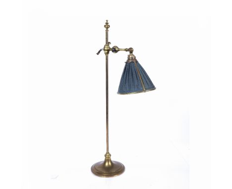 Brass student's lamp 1930's, with adjustable shade, 63cm high Condition: discolouration and silk shade is slightly worn
