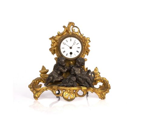 Mantel clock late 19th Century, with gilt painted scrolling acanthus decoration, the white enamel dial with roman numerals, t