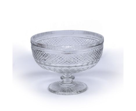 Cut glass centre bowl probably Irish, with facet and fluted banding, 27.5cm diameter, 20.5cm high Condition: some light scrat