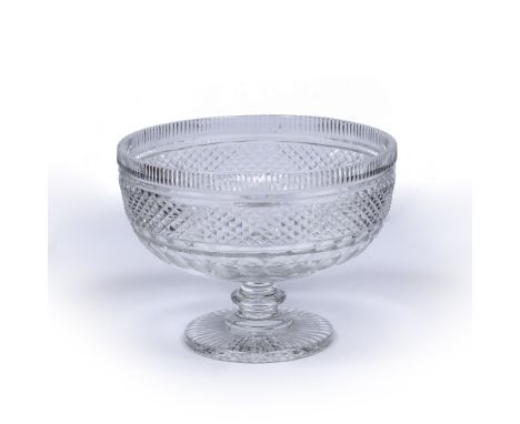 Cut glass centre bowl probably Irish, with facet and fluted banding, 27.5cm diameter, 20.5cm high Condition: some light scrat