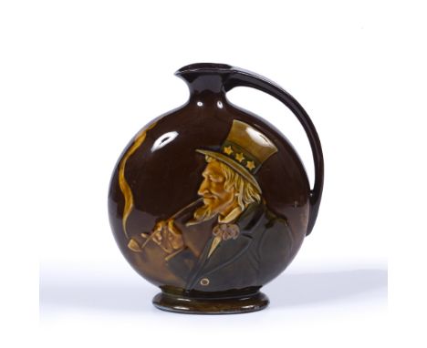 Doulton Dewars Scotch whisky jug one side with profile head of an American smoking a clay pipe Condition: slight wear, firing
