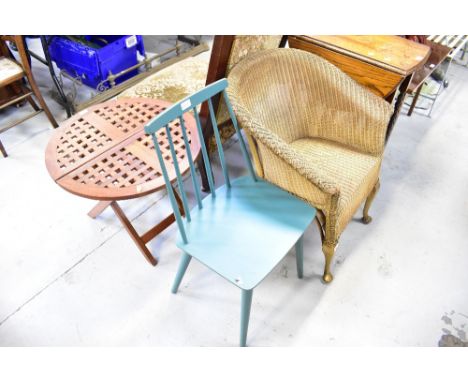 A Lloyd Loom style gold-coloured bedroom chair, a turquoise painted stick back chair and a modern hardwood folding picnic tab