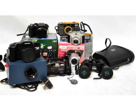 A large collection of cameras and camera equipment to include a Fujifilm Finepix S7000 digital camera, a Minotla FS-E II, a C